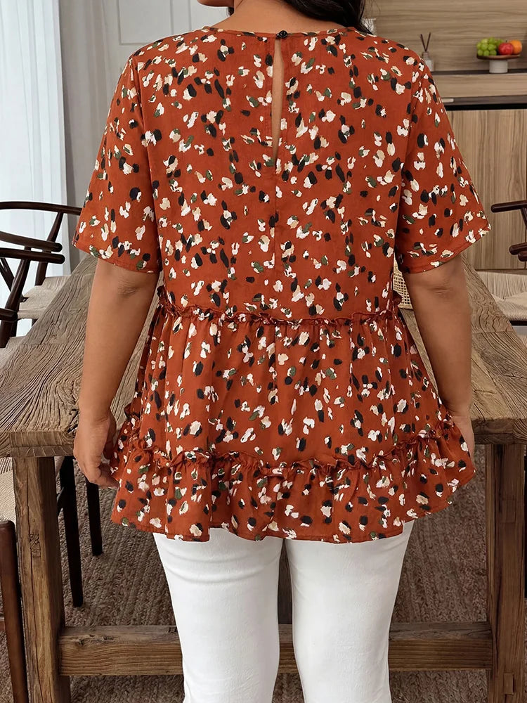 Abstract-Print Ruffle-Hem Peplum Top