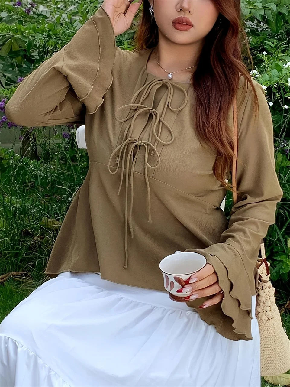 Triple-Tie Flared-Sleeve Peplum Top