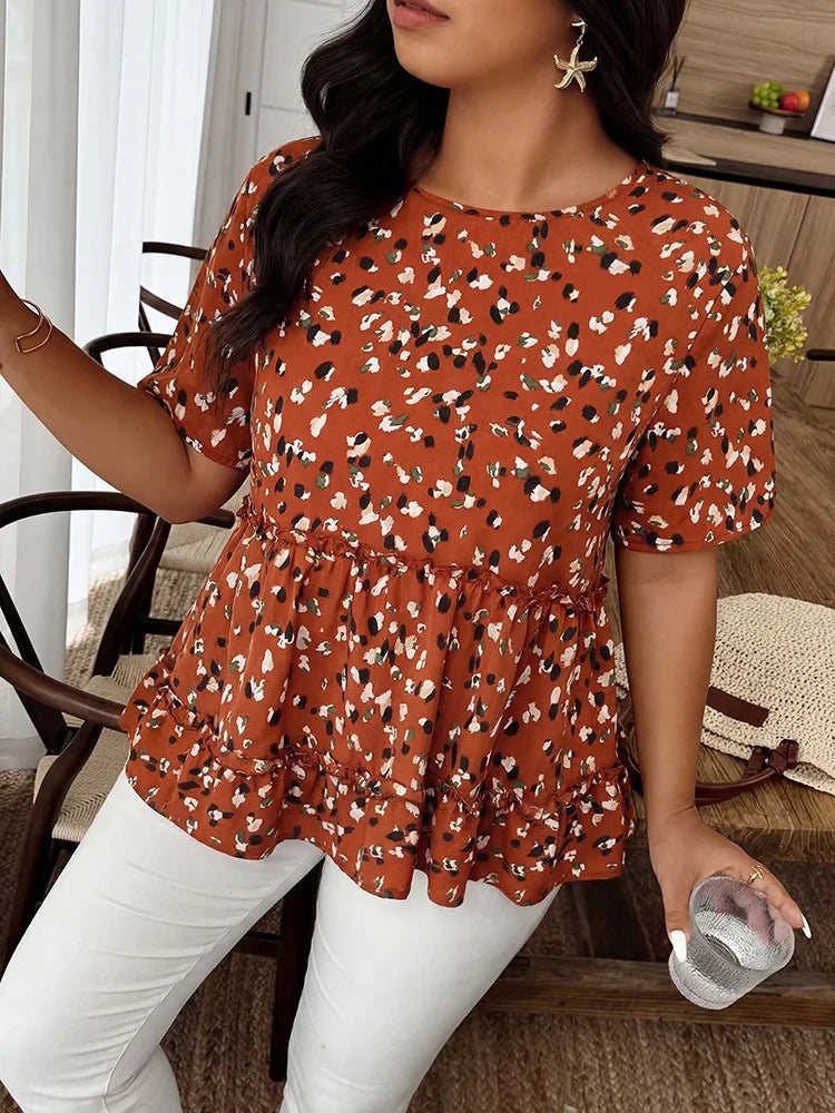 Abstract-Print Ruffle-Hem Peplum Top